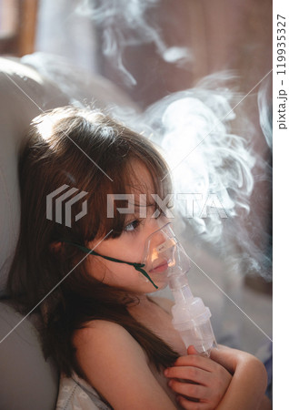 Little girl using inhaler Little girl using inhaler 119935327