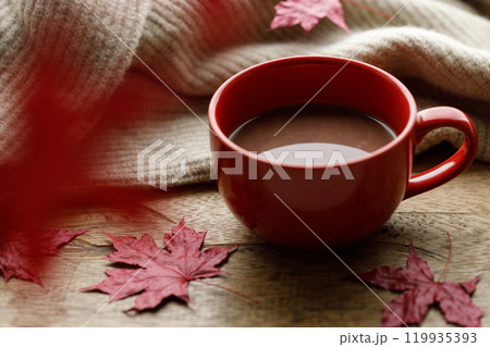 Cup of delicious hot chocolate on wooden table background. Cup of delicious hot chocolate on wooden table background. 119935393