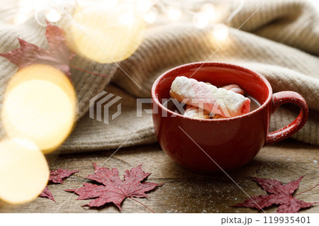 Cup of delicious hot chocolate on wooden table background. 119935401