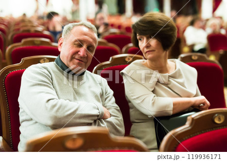 Caucasian senor sleeping in the theater hall Caucasian senor sleeping in the theater hall 119936171