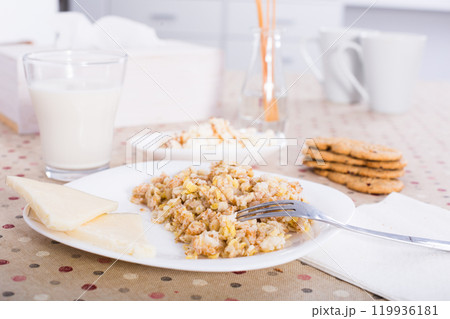 Breakfast of oatmeal, biscuits and milk Breakfast of oatmeal, biscuits and milk 119936181