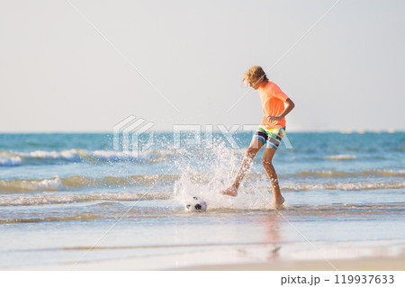 Kids playing on beach. Children play at sea. 119937633