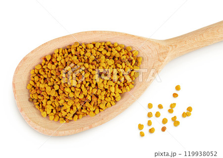 Bee pollen grains in wooden spoon isolated on white background. Top view. Flat lay Bee pollen grains in wooden spoon isolated on white background. Top view. Flat lay 119938052