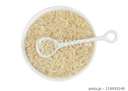 rice basmati in a ceramic bowl isolated on white background. Top view. Flat lay 119938140