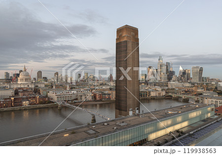 View of Chimney at Tate Modern art museum, St Paul's cathedral, The skyscrapers with the Millennium Bridge. View of Chimney at Tate Modern art museum, St Paul's cathedral, The skyscrapers with the Millennium Bridge. 119938563