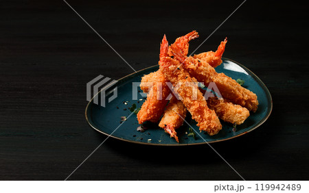 Fried shrimp, peeled in tempura, soy sauce, close-up, 119942489