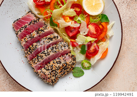 fillet of red tuna meat, fried in sesame seeds, homemade, close-up, no people, 119942491