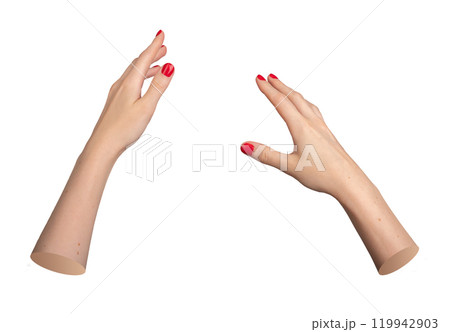 two hands with red-painted nails, positioned as if reaching or grasping. The hands are isolated on a two hands with red-painted nails, positioned as if reaching or grasping. The hands are isolated on a 119942903
