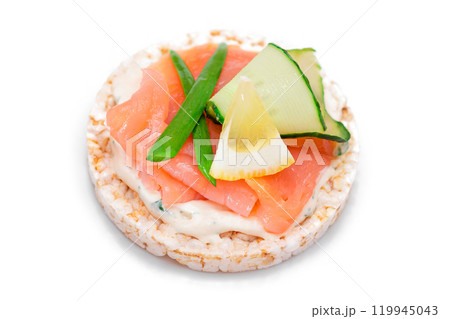 Rice Cake Sandwich with Fresh Salmon, Lemon and Greens - Isolated 119945043