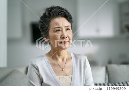 portrait of an unhappy asian elderly woman 119949209