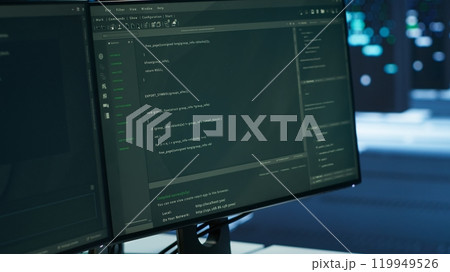Close up of computer peripherals used by engineers coding in modern data center, monitoring security threats. PC monitors used by server room employees ensuring compliance with regulations Close up of computer peripherals used by engineers coding in modern data center, monitoring security threats. PC monitors used by server room employees ensuring compliance with regulations 119949526