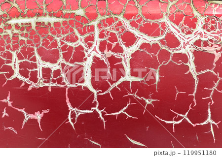 Texture or background of the metal wall is painted red with rust. and has corrosion, damage, chipping and peeling. 119951180