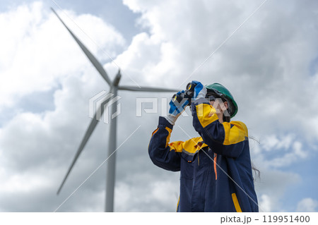 Renewable energy systems concept, engineer female working survey wind turbine for alternative energy, Technology protect environment reduce global warming problems. 119951400
