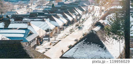 Ouchi Juku ancient farmer house village with snow in winter, former post town along the Aizu-Nishi Kaido trade route during the Edo Period. Shimogo town, Minamiaizu, Fukushima Prefecture, Japan 119956029