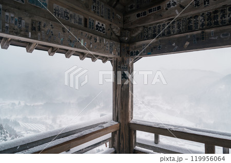 view of village with snow in winter from mountain viewpoint of Yamadera temple, the popular name for the Buddhist temple of Risshakuji located in Yamagata City, in Yamagata Prefecture, Tohuku, Japan 119956064