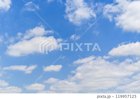 White clouds in a bright blue sky. The beauty of the nature White clouds in a bright blue sky. The beauty of the nature 119957125