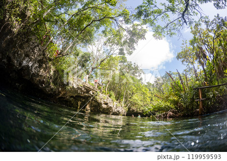Diving in Mexican Cenote underwater cave 119959593