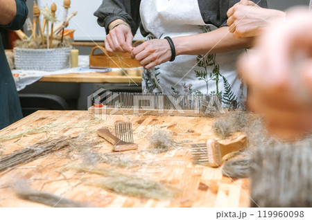 Crafting natural fibers at artisanal workshop for creative handmade projects 119960098
