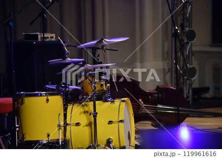 Yellow drum kit musical instrument on stage Yellow drum kit musical instrument on stage 119961616