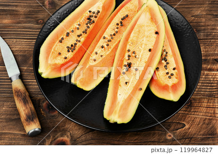 Raw fresh papaya. 119964827