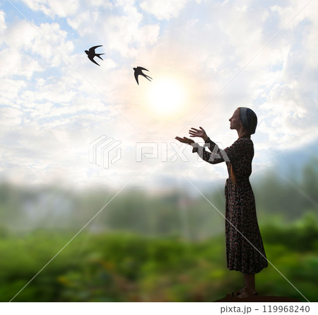 Young girl praying to God Young girl praying to God 119968240