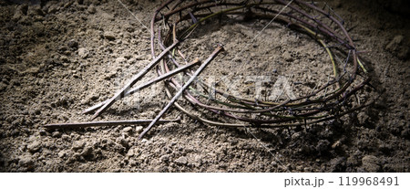 Rusty wreath of thorns at the cross 119968491