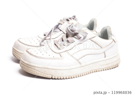 White children's sneakers isolated on white White children's sneakers isolated on white 119968836