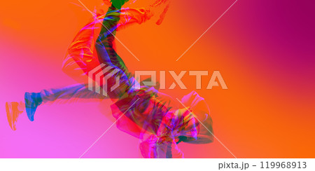 Street dancer leaping mid-air, dancing hip hop, freestyle, with overlays of pink, orange, and red hues. Energy of hip-hop culture 119968913