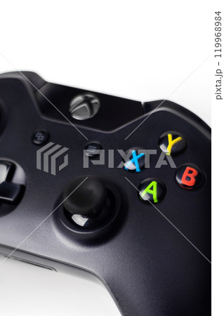 White Xbox One S Controller, Joystick on a black background close up vertical 119968984