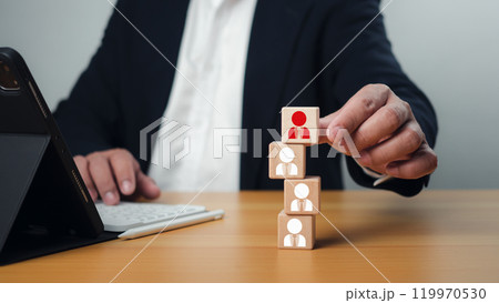 Business recruiter with one person shown with wooden cubes with icons, Recruitment employee and talent management with Successful business team leader concept, Personal auditing or CRM concept. 119970530
