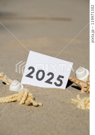 2025 text start new year symbol on paper greeting card on background of starfish summer vacation decor. Sandy beach sun coast. Holiday concept postcard. Getting away Travel 2025 2025 text start new year symbol on paper greeting card on background of starfish summer vacation decor. Sandy beach sun coast. Holiday concept postcard. Getting away Travel 2025 119971382