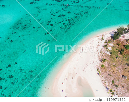 Beautiful vibrant tropical sea of Lipe Island with coral reef and the beach in summer Beautiful vibrant tropical sea of Lipe Island with coral reef and the beach in summer 119971522