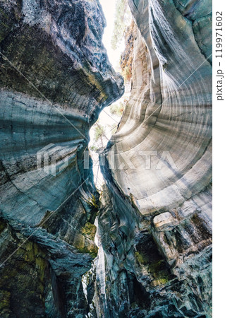 Maligne canyon of rock eroded by river on winter at Jasper national park, Canada 119971602