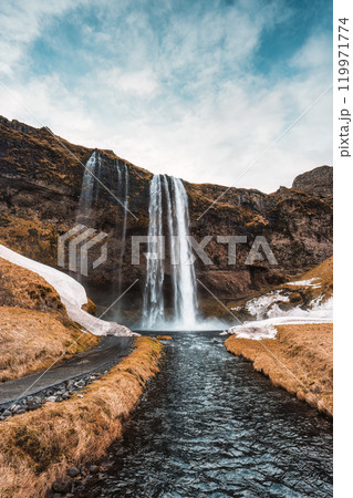 Seljalandsfoss waterfall flowing in autumn wilderness at Iceland Seljalandsfoss waterfall flowing in autumn wilderness at Iceland 119971774