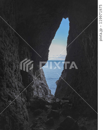 Narrow hole in the cave, an exit from the dungeon 119971975
