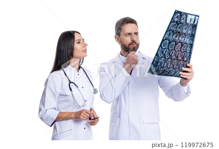 healthcare and medicine. healthcare with doctor on diagnostic examination in clinic. Doctor and Radiologist Discuss Diagnosis with mri scan. doctor give quality healthcare. Neurologist treatment healthcare and medicine. healthcare with doctor on diagnostic examination in clinic. Doctor and Radiologist Discuss Diagnosis with mri scan. doctor give quality healthcare. Neurologist treatment 119972675
