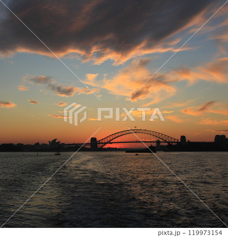 Skyline of Sydney and harbour bridge at sunset, Australia. Skyline of Sydney and harbour bridge at sunset, Australia. 119973154