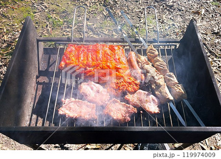 delicious grilled meat with a smoky flavor delicious grilled meat with a smoky flavor 119974009