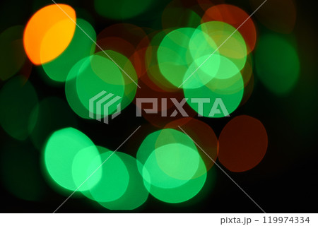 Christmas decorations concept. Defocused light of colorful garland. Abstract colorful bokeh background. Festive backdrop with colorful lights. Bright and festive atmosphere of coming holiday 119974334