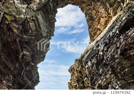 Natural stone arches of the Catedrales beach in Ribadeo, Lugo, Galicia (Playa de Aguas Santas)	 119974392