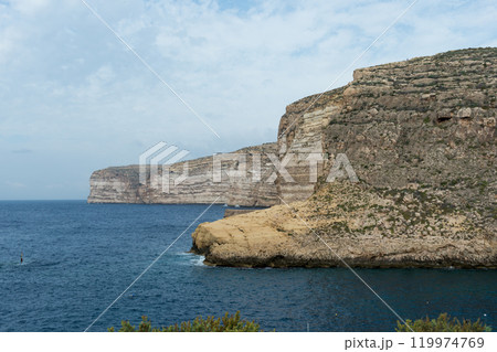 Beautiful rocky coast of Gozo island, Malta. Beautiful rocky coast of Gozo island, Malta. 119974769