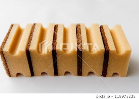 five dish yellow sponges on the white background. five dish yellow sponges on the white background. 119975235