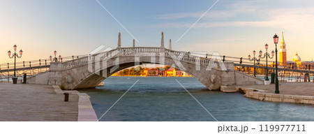 Pedestrian bridge over a canal at dawn in Venice, Italy 119977711