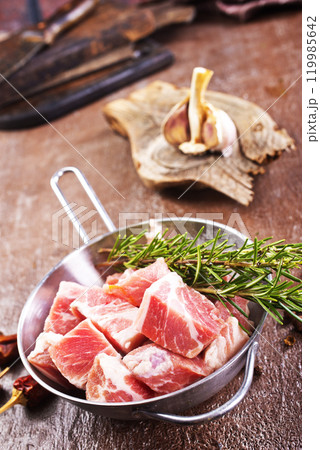 raw meat with spice in pan raw meat with spice in pan 119985642