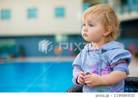 little cute baby near the pool little cute baby near the pool 119986910