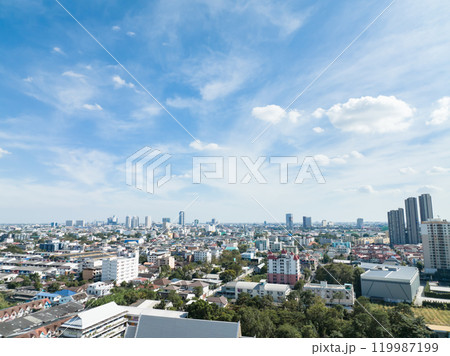 panoramic Afternoon sunlight image of suburbs stretching big city which was shrouded in mist and the sky was wide, Wat Dhammamongkol in Jan 2022 119987199