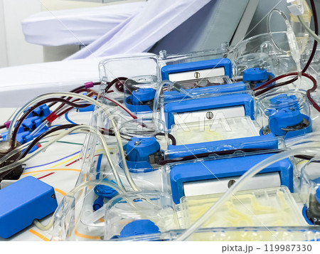 Blood platelet donation Machine is working, it draws blood from arm for separate Platelet from blood at a hospital. 119987330