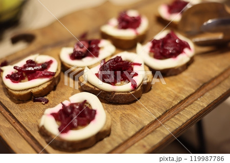 Delicious Canaps with Cream Cheese and Beetroot Topping 119987786