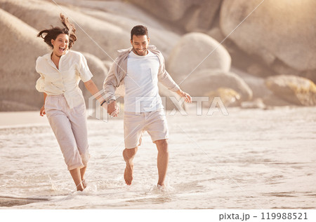 Running, happy couple and holding hands at beach on vacation, summer holiday or travel outdoor together. Laugh, man and woman at sea for love, support and connection for romantic relationship on date Running, happy couple and holding hands at beach on vacation, summer holiday or travel outdoor together. Laugh, man and woman at sea for love, support and connection for romantic relationship on date 119988521