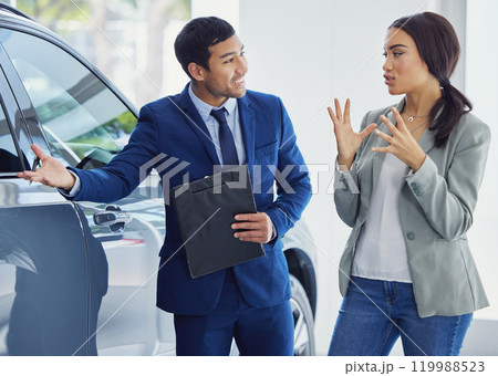 People, salesman and car dealership with client, presenting and confident in transport, loan or test drive in vehicle. Woman, man and excited in showroom for decision in buying new automobile in shop People, salesman and car dealership with client, presenting and confident in transport, loan or test drive in vehicle. Woman, man and excited in showroom for decision in buying new automobile in shop 119988523